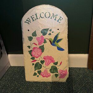 Painted Welcome sign on slate